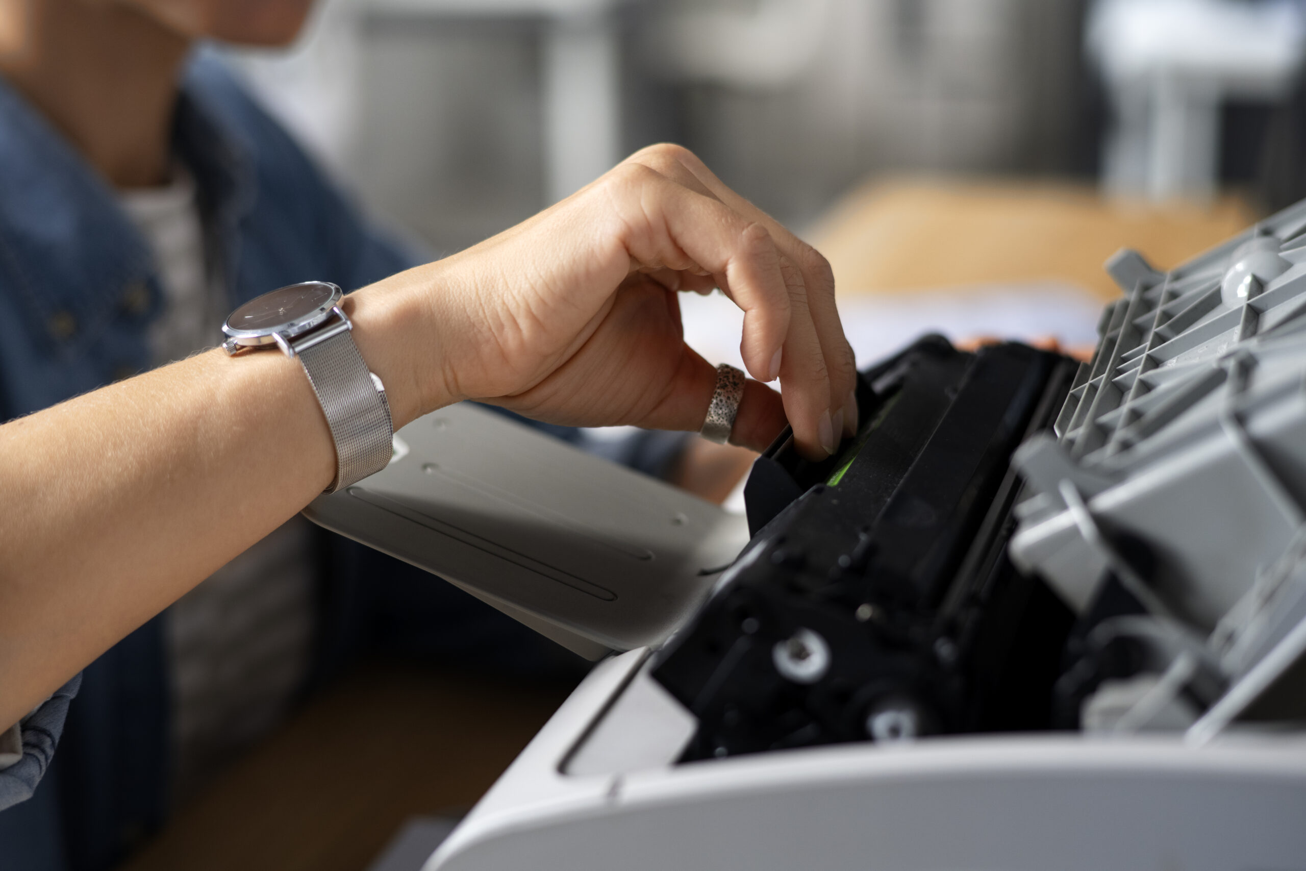 side view worker using printer side view worker using printer